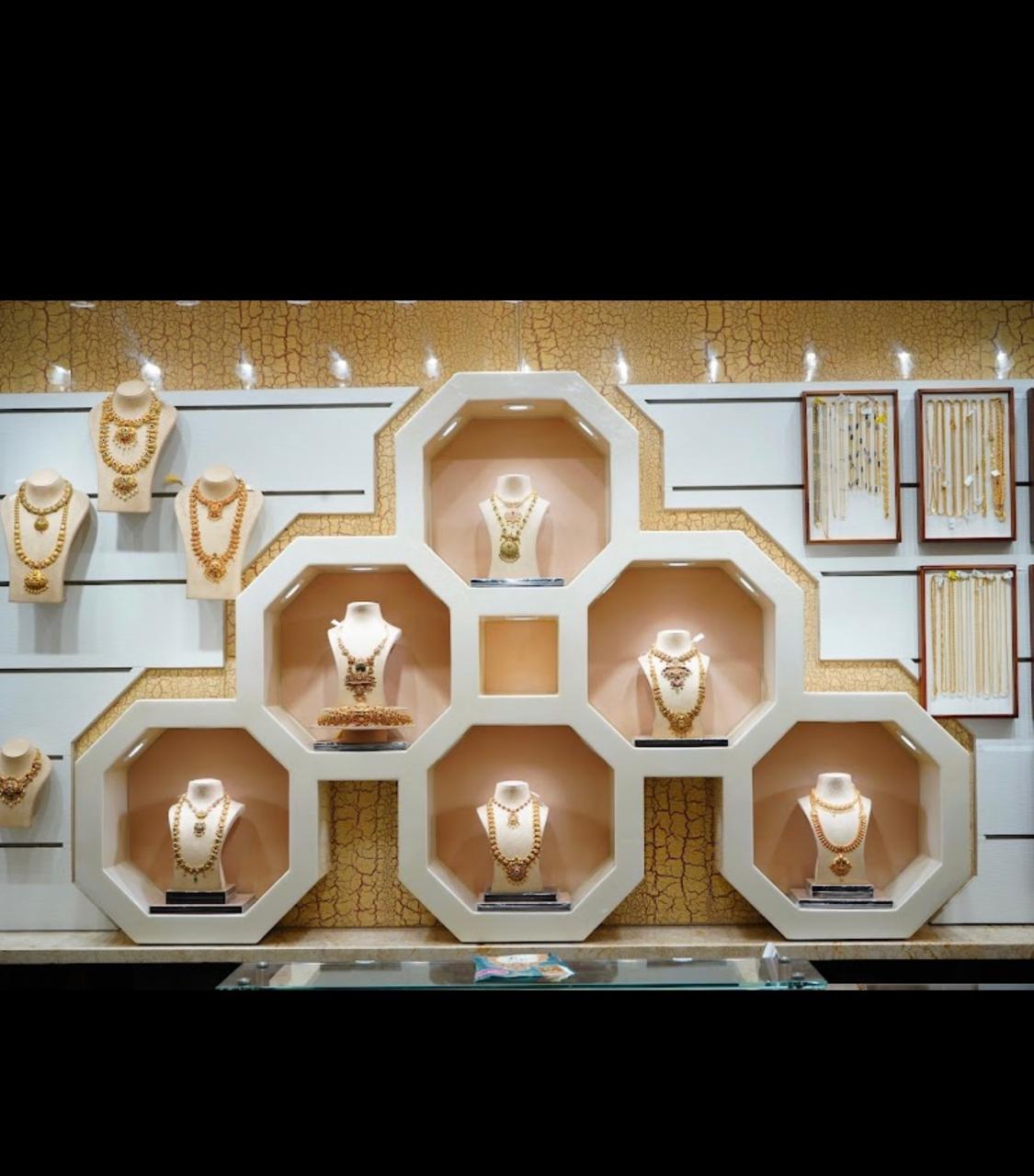 Raasi Jewellers gold display frame